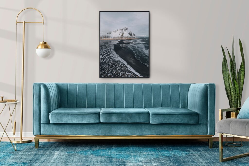 Chic teal rug and couch in a contemporary living room