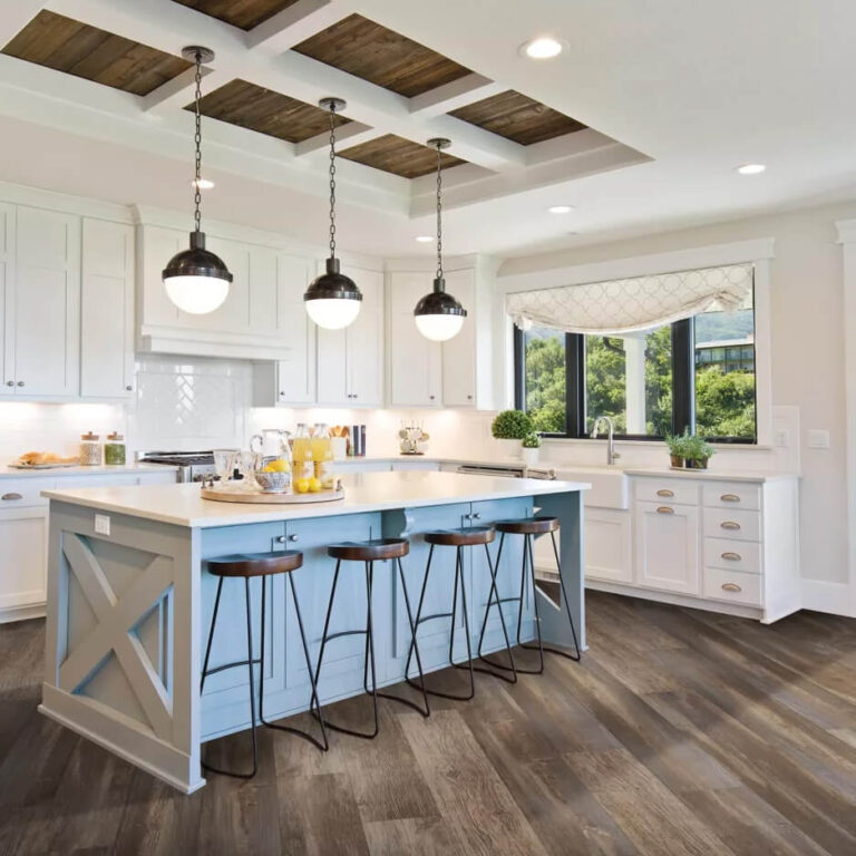 wide plank laminate kitchen flooring installed on the diagonal