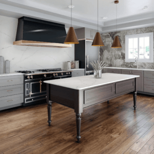 traditional farmhouse kitchen with engineered floors, free standing island and very large gas range and black hood vent