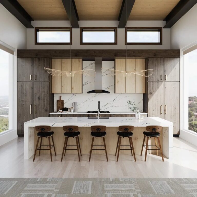 Show stopping kitchen with high ceilings, large island and light laminate flooring