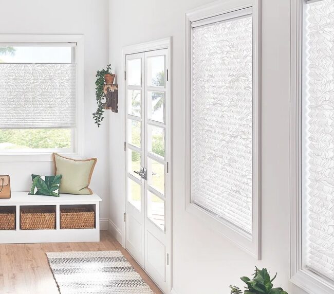 Picture of white pleated shades in a family room
