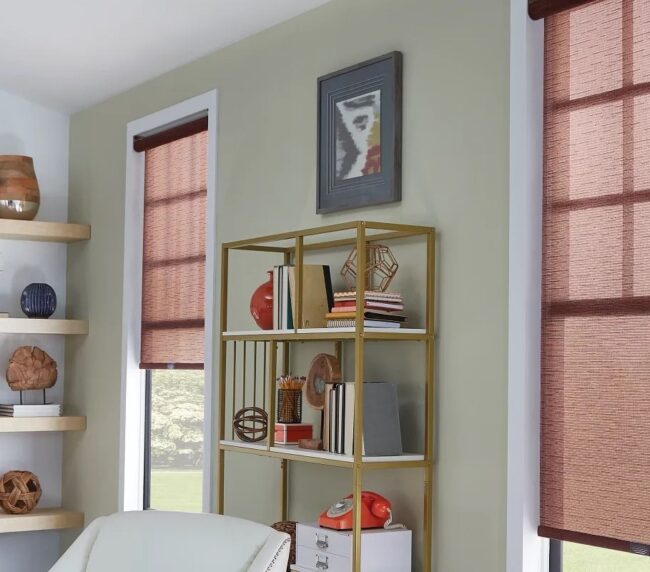 Brown solar shades covering bedroom windows